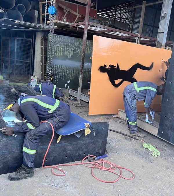 Fabrication and installation of metallic display structure